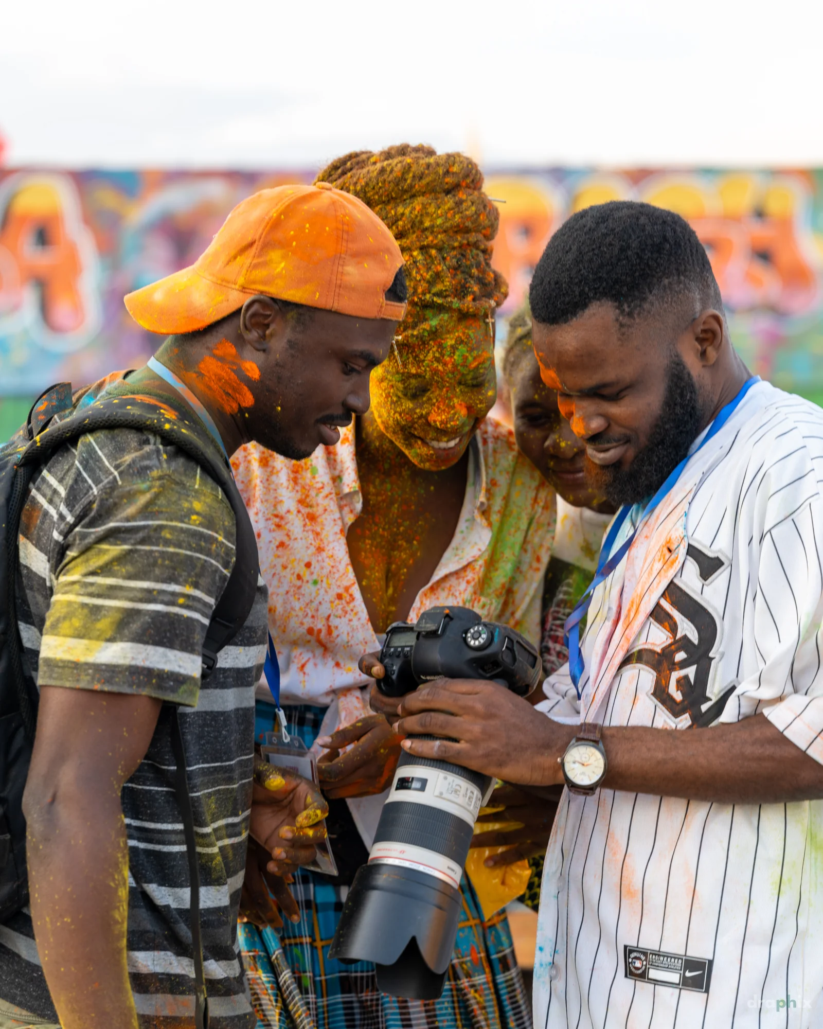 Photographers reviewing a camera