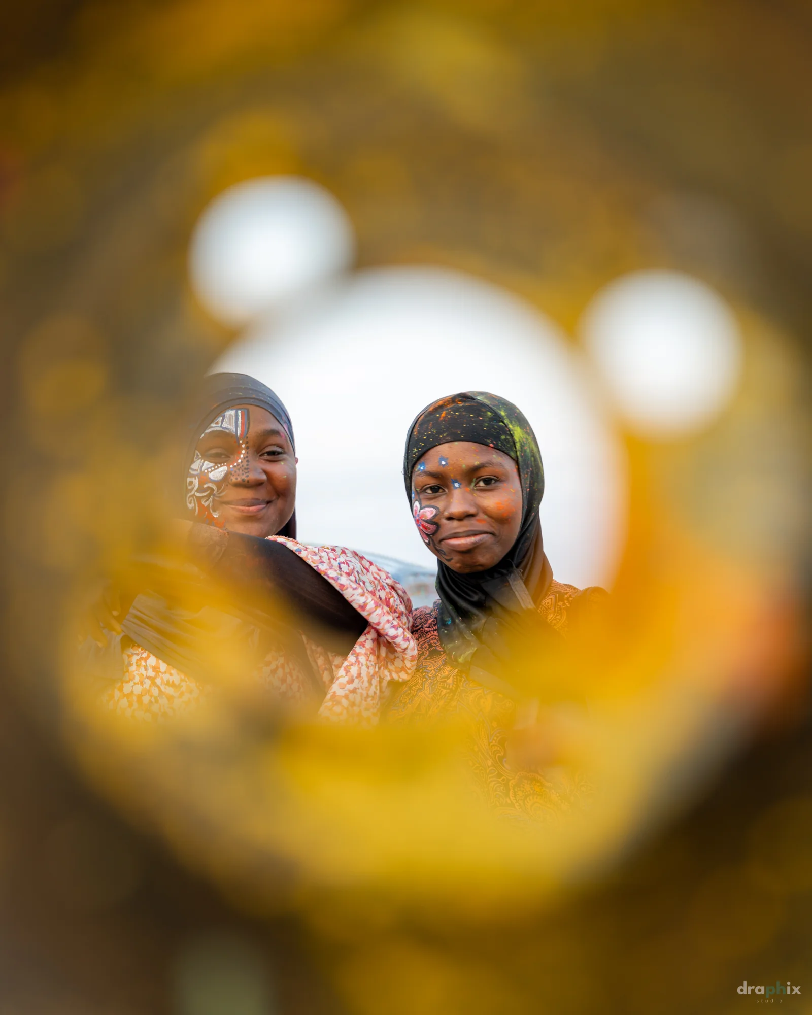 Portrait through a yellow frame