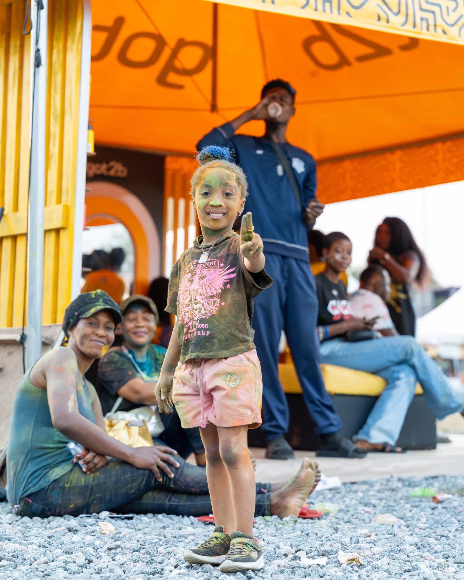 Group portrait near a vendor stand