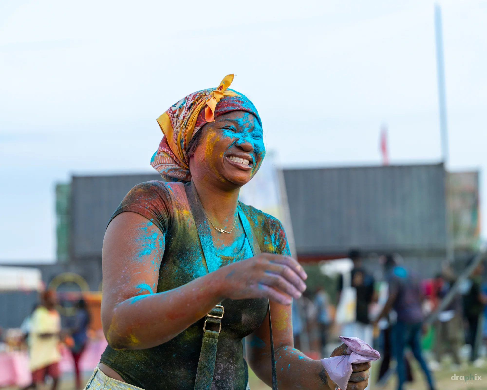 Laughing color-powder portrait