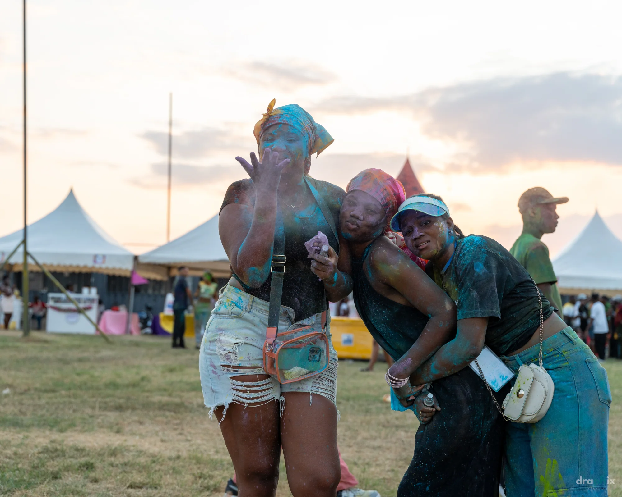 Friends posing at sunset