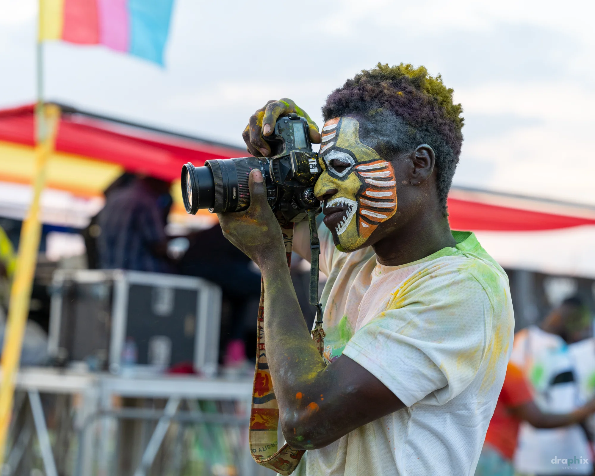 Close-up of a festival photographer