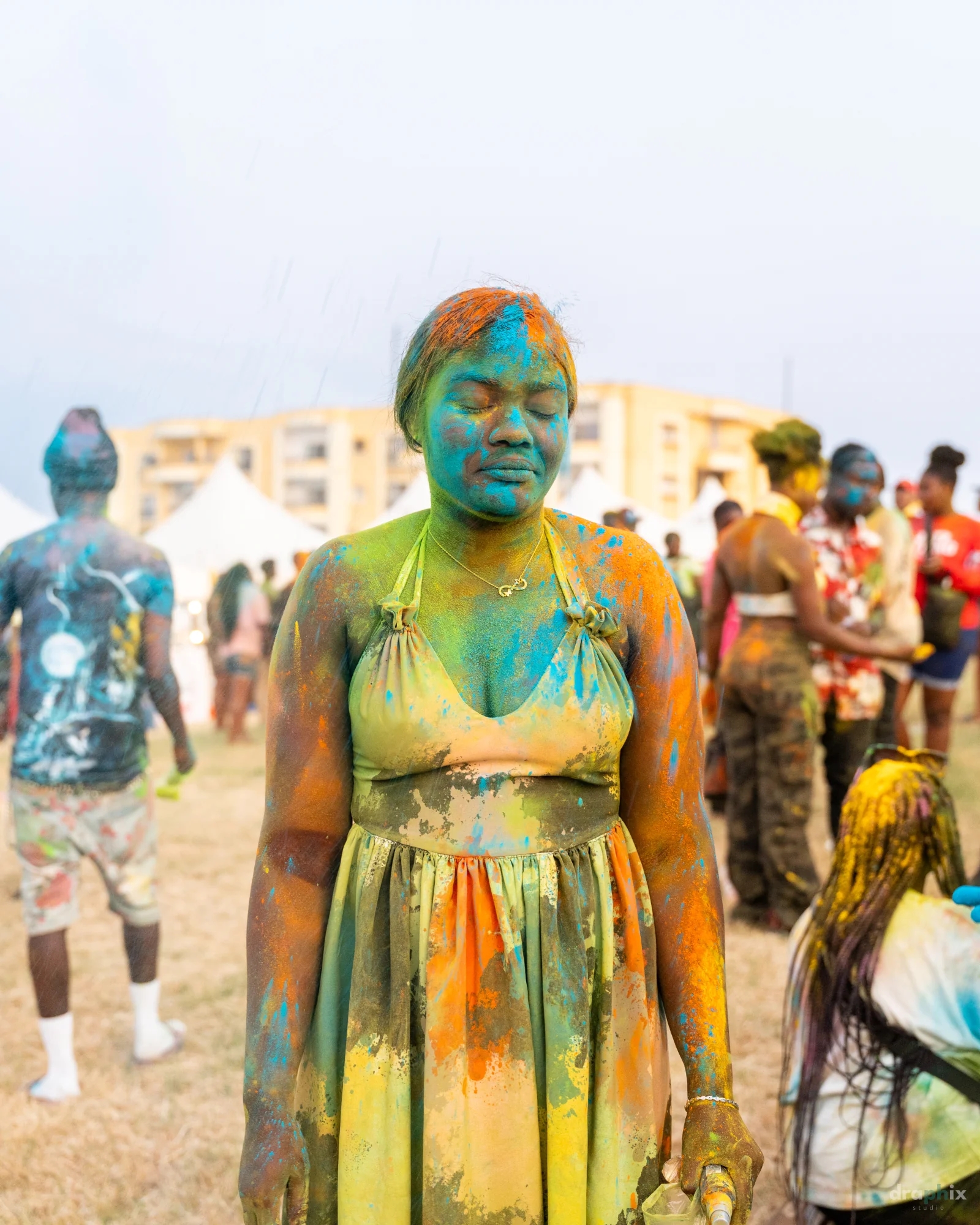 Woman covered in green powder